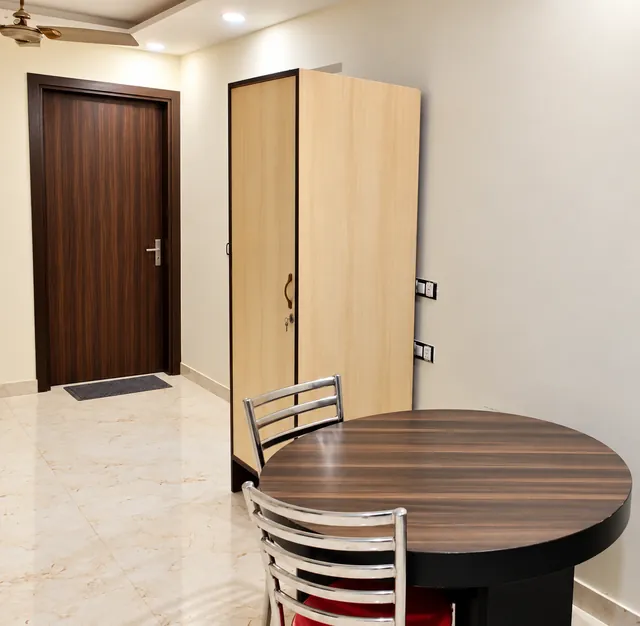Round dining table and wardrobe